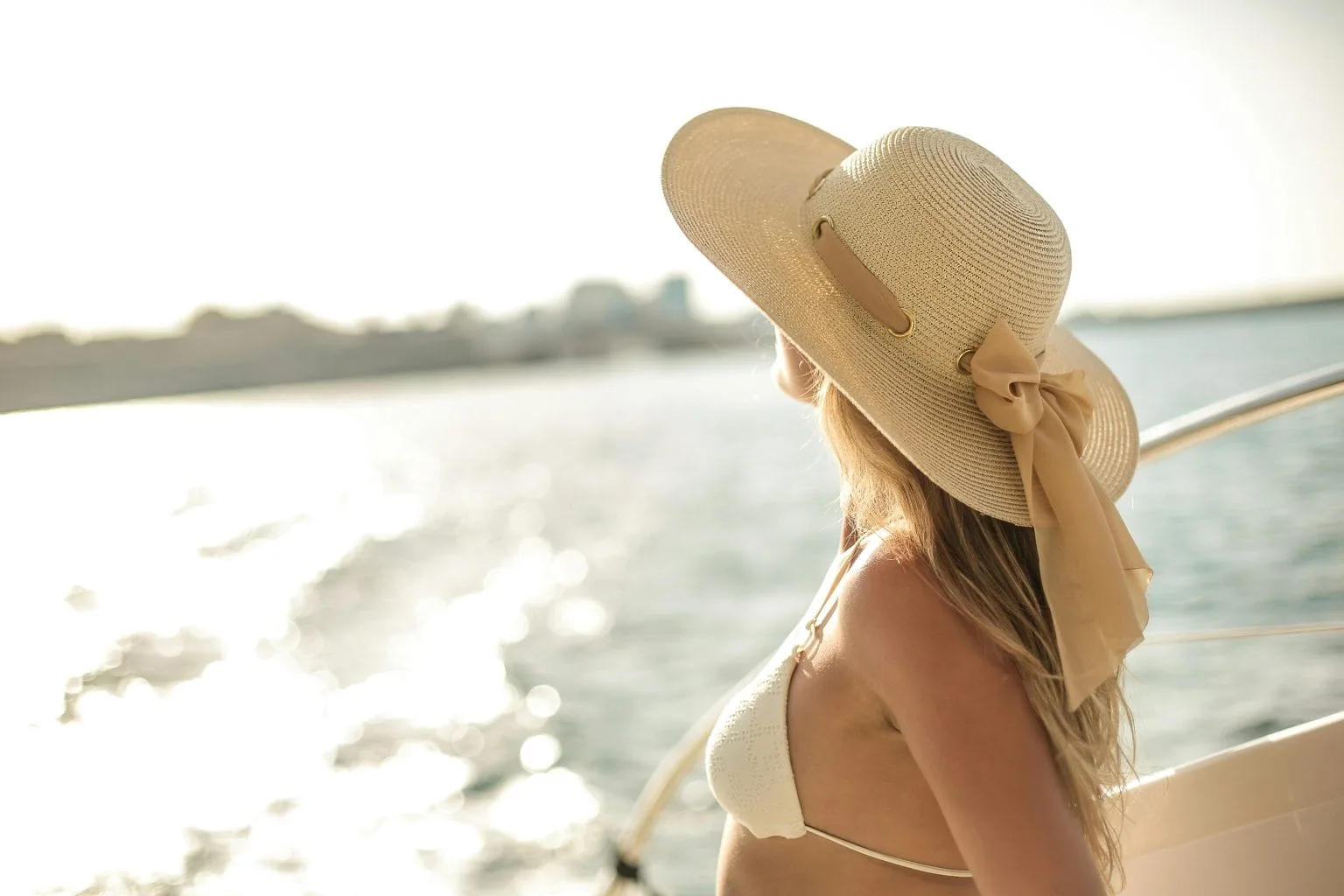 Being A Cam Girl - The Ultimate Summer Side Hustle - a cam model on a boat on holiday.
